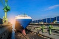 ShipyardÃ¢â¬â¹ frontÃ¢â¬â¹ viewÃ¢â¬â¹ ShipÃ¢â¬â¹ mooredÃ¢â¬â¹ inÃ¢â¬â¹ floatingÃ¢â¬â¹ dockÃ¢â¬â¹ underÃ¢â¬â¹ repairÃ¢â¬â¹ inÃ¢â¬â¹ shipyardÃ¢â¬â¹